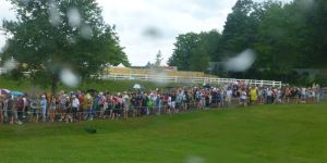 Line up for parking shuttle in pouring rain at PanAm games